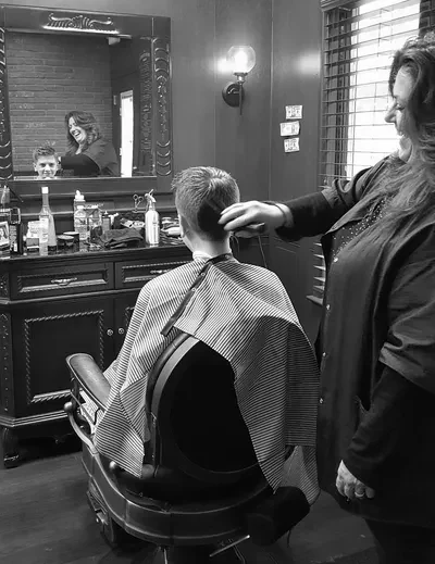A haircut in progress at Downtown Barber
