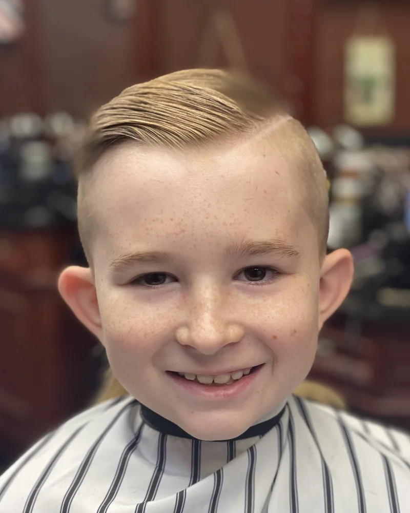 Boy with a side part